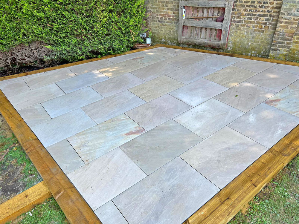 Indian sandstone patio from above Raised Indian Sandstone Patio, Royal Tunbridge Wells. Award-Winning Paving