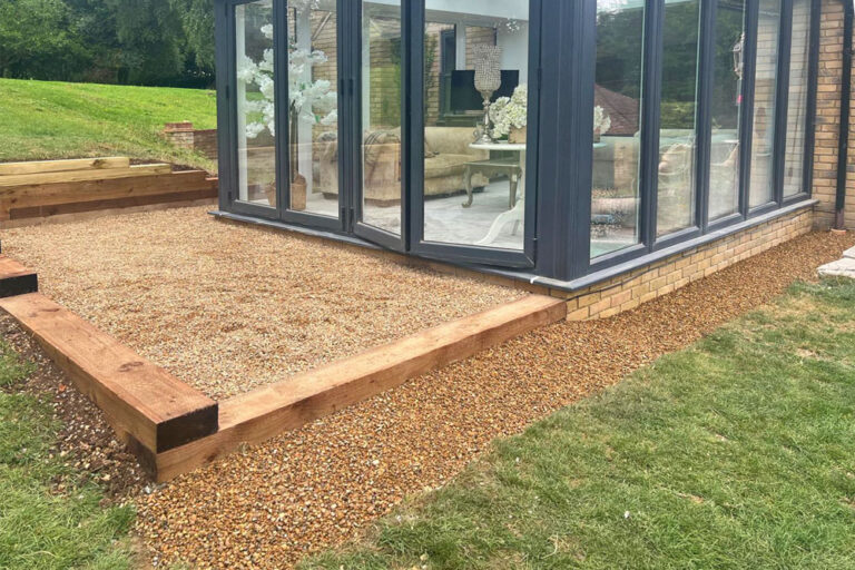Gravel Area and Sleeper Retaining Wall, Maidstone. Award-Winning Paving