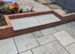Sandstone Patio and Brick Retaining Wall, Gravesend. Award-Winning Paving